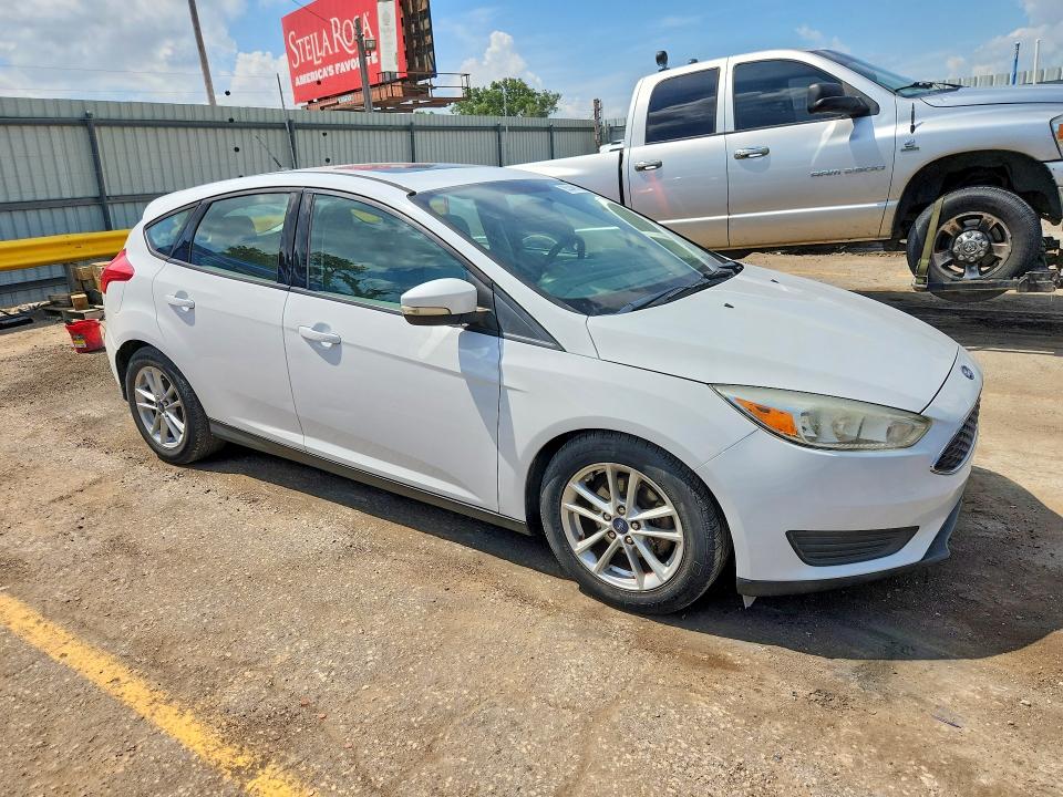 Photo 4 from auction – 2016 FORD FOCUS with VIN 1FADP3K29GL269349