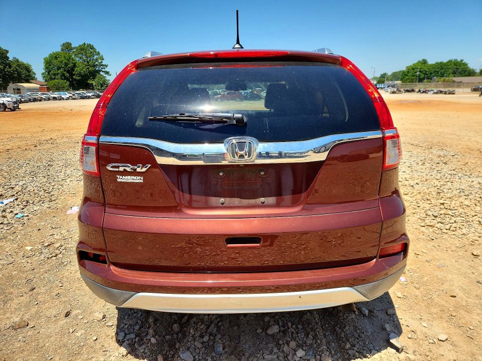 Photo 6 from auction – 2015 HONDA CR-V with VIN 2HKRM3H72FH550200