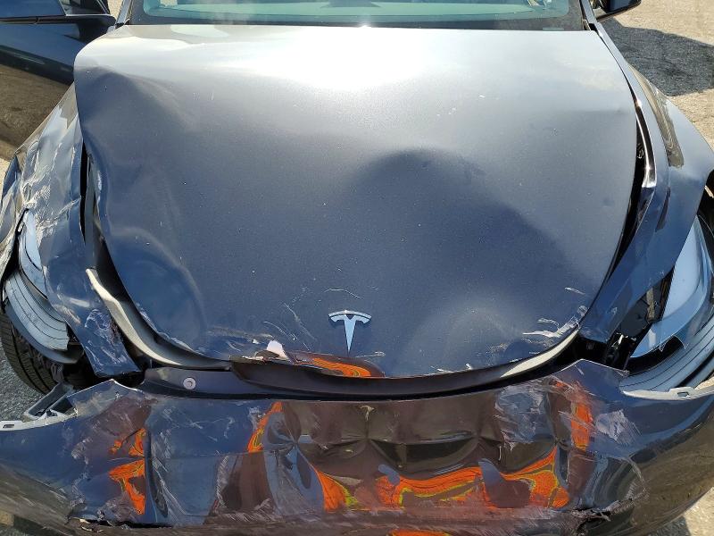 Photo 11 from auction – 2024 TESLA MODEL Y with VIN 7SAYGDEE8RA234847