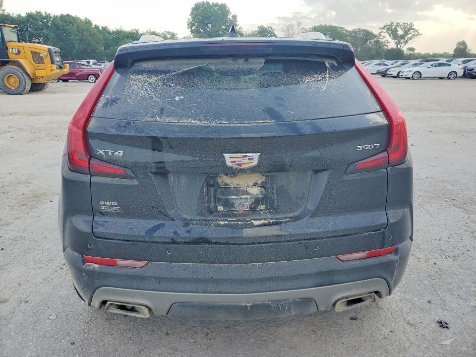 Photo 6 from auction – 2023 CADILLAC XT4 with VIN 1GYFZDR40PF100551
