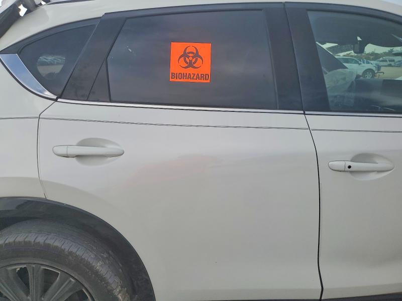 Photo 11 from auction – 2023 MAZDA CX-5 with VIN JM3KFBAY5P0150579