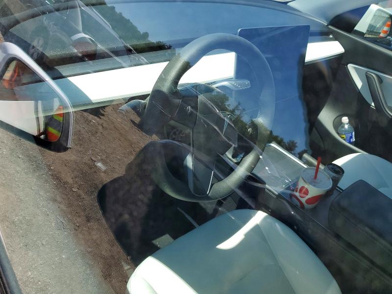 Photo 8 from auction – 2021 TESLA MODEL Y with VIN 5YJYGDEE6MF246679