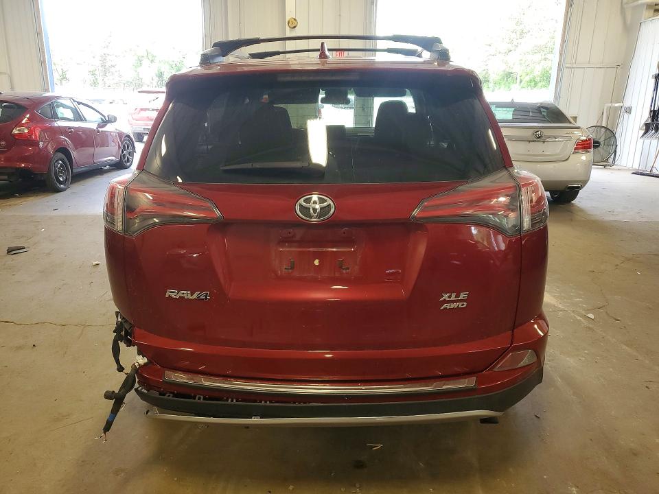 Photo 6 from auction – 2018 TOYOTA RAV4 with VIN JTMRFREV7JD256807