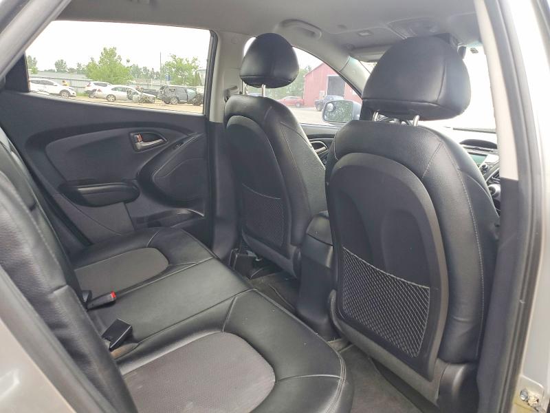 Photo 11 from auction – 2012 HYUNDAI TUCSON with VIN KM8JUCAC5CU459701