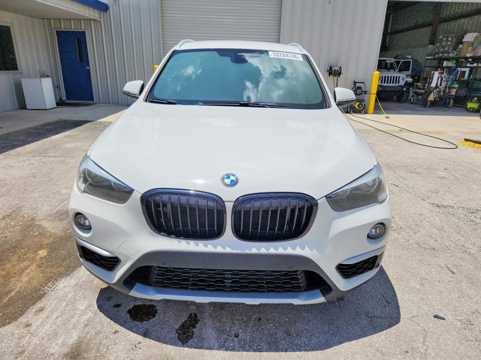 Photo 5 from auction – 2018 BMW X1 with VIN WBXHU7C33J5L06123