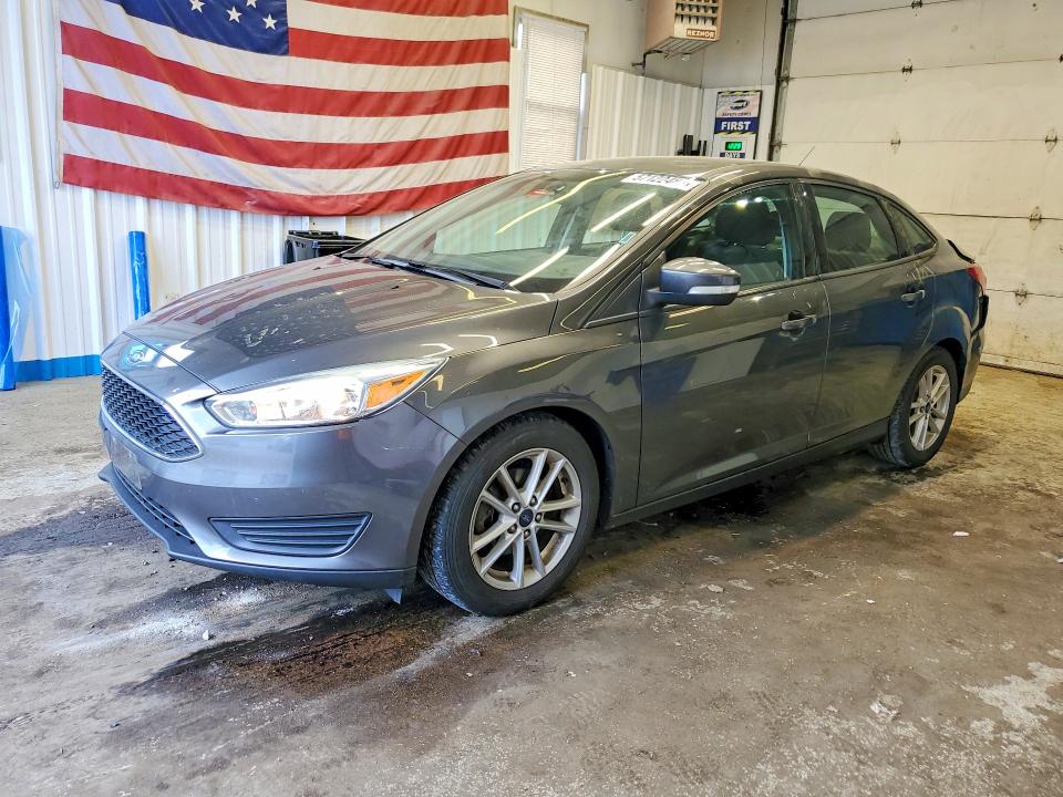 FORD FOCUS 2016 with VIN 1FADP3F25GL365831 - Photo from auction