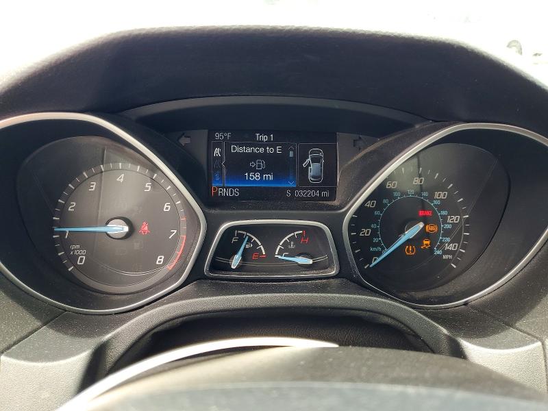 Photo 9 from auction – 2014 FORD FOCUS with VIN 1FADP3N21EL263991