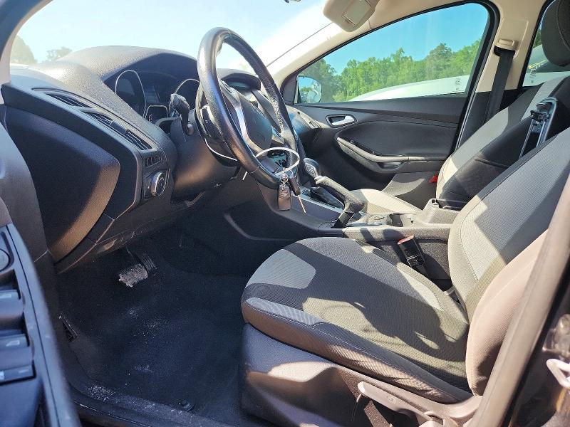 Photo 7 from auction – 2014 FORD FOCUS with VIN 1FADP3F27EL386693