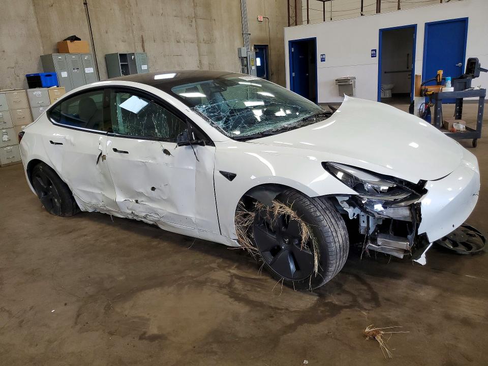 Photo 4 from auction – 2022 TESLA MODEL 3 with VIN 5YJ3E1EB1NF195808