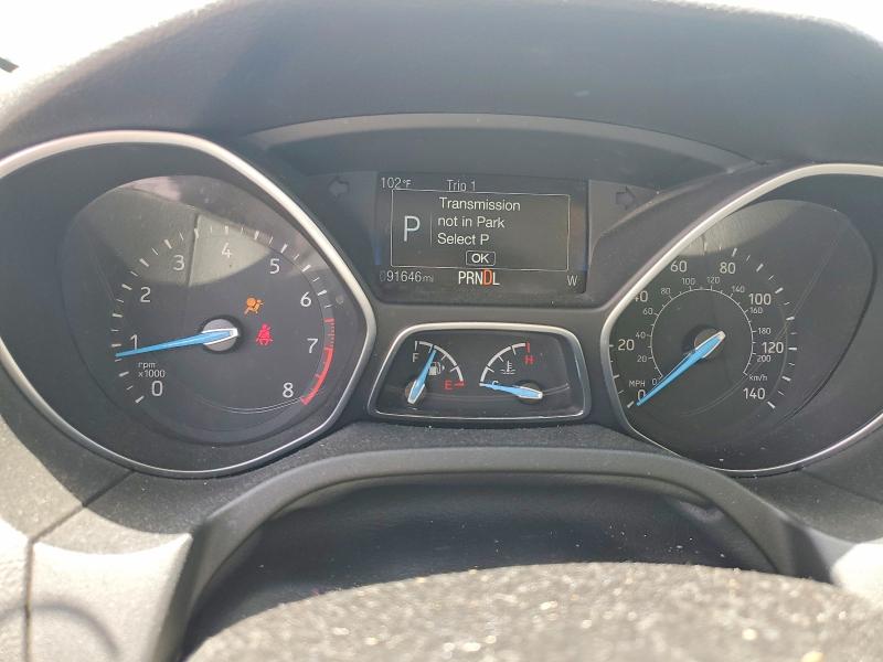 Photo 9 from auction – 2015 FORD FOCUS with VIN 1FADP3F21FL232336