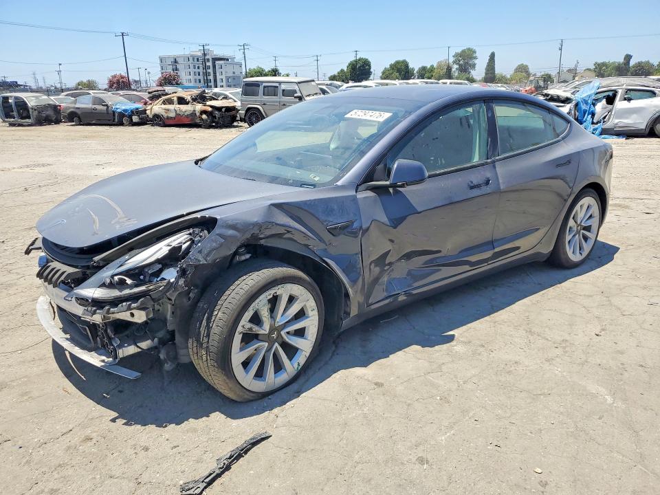 TESLA MODEL 3 2022 with VIN 5YJ3E1EA9NF296702 - Photo from auction