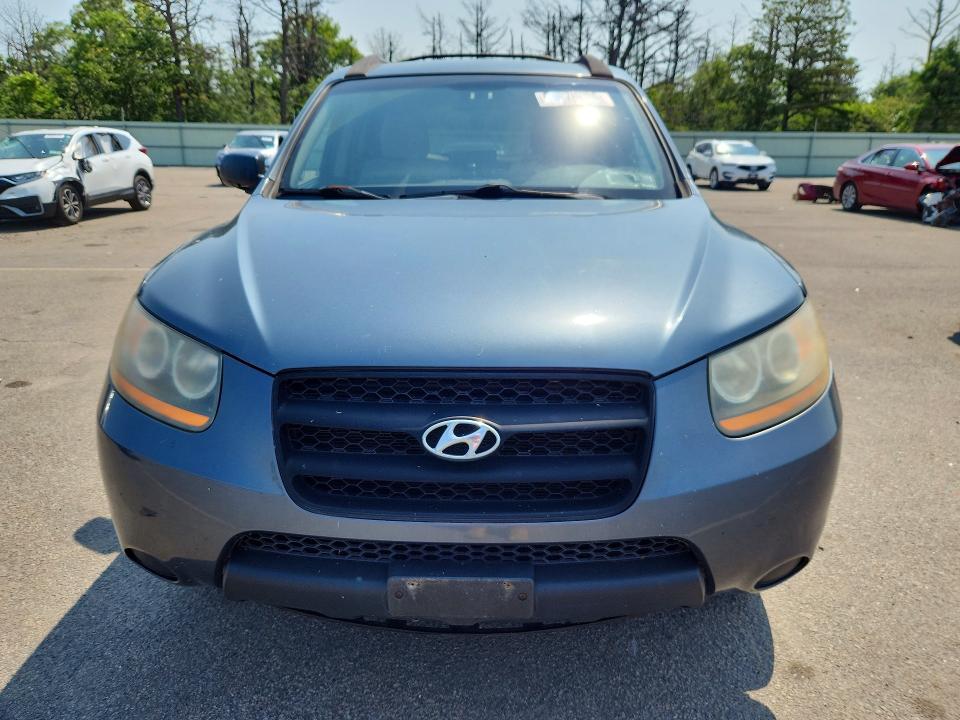 Photo 5 from auction – 2009 HYUNDAI SANTA FE with VIN 5NMSG13D99H233395