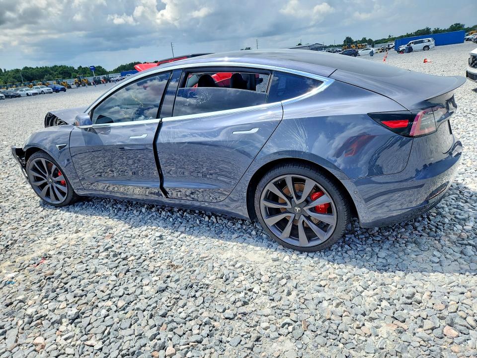 Photo 2 from auction – 2020 TESLA MODEL 3 with VIN 5YJ3E1EC2LF713513