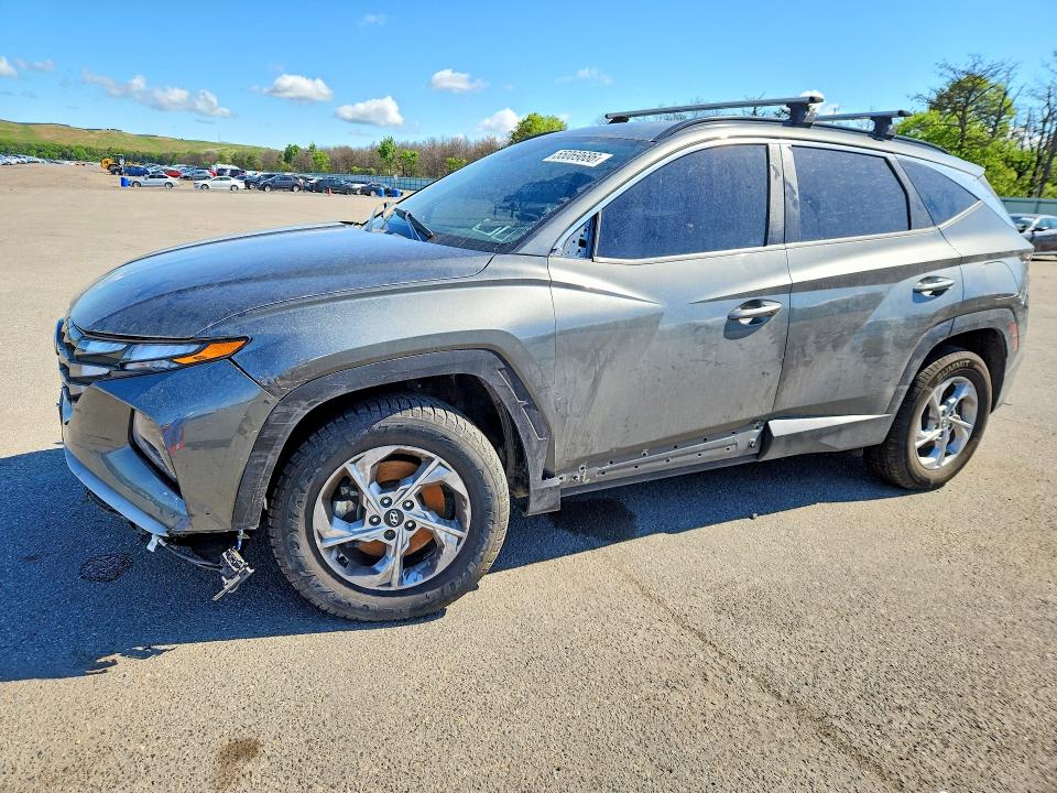 HYUNDAI TUCSON 2022 with VIN 5NMJBCAE0NH067604 - Photo from auction