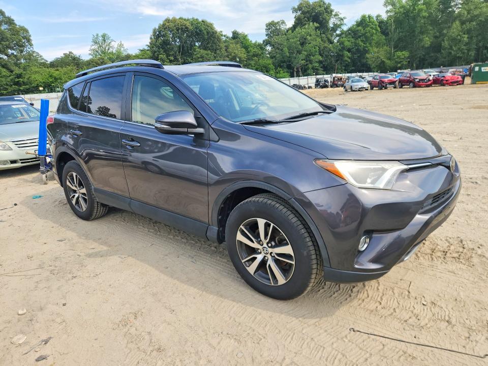 Photo 4 from auction – 2018 TOYOTA RAV4 with VIN JTMRFREV6JJ717061