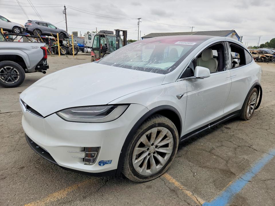 TESLA MODEL X 2021 with VIN 5YJXCDE21MF311418 - Photo from auction