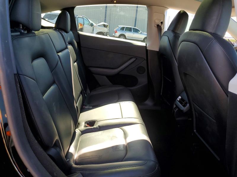 Photo 11 from auction – 2023 TESLA MODEL Y with VIN 7SAYGDEE4PA139053