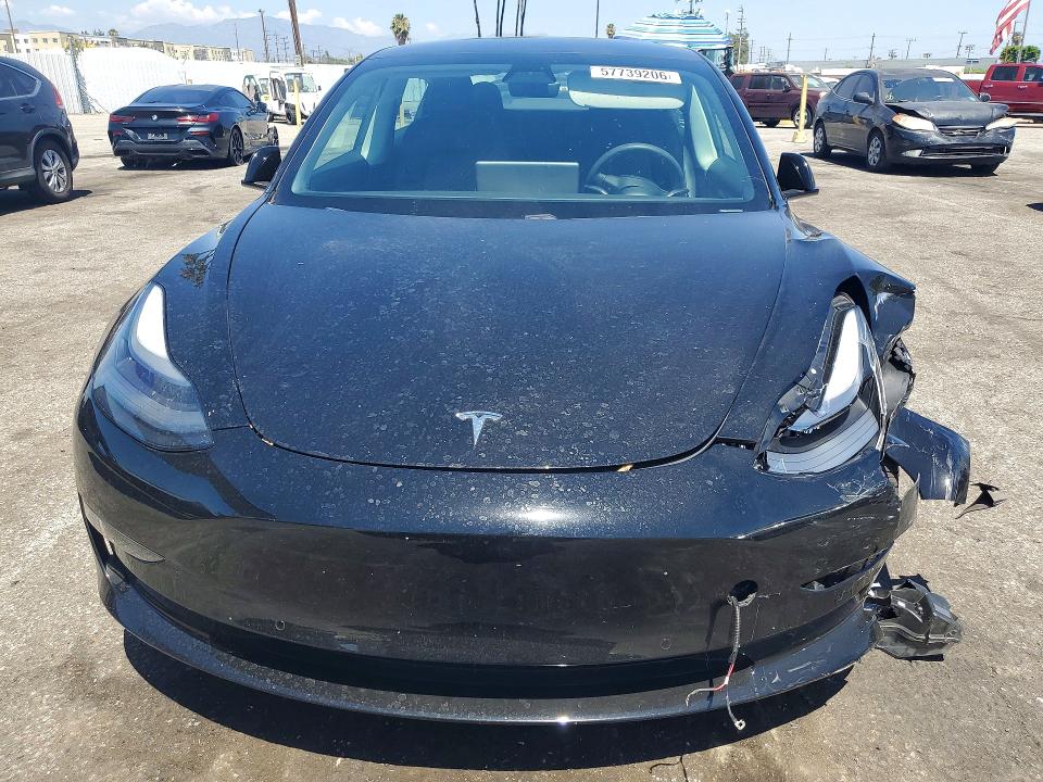 Photo 5 from auction – 2021 TESLA MODEL 3 with VIN 5YJ3E1EA7MF074710