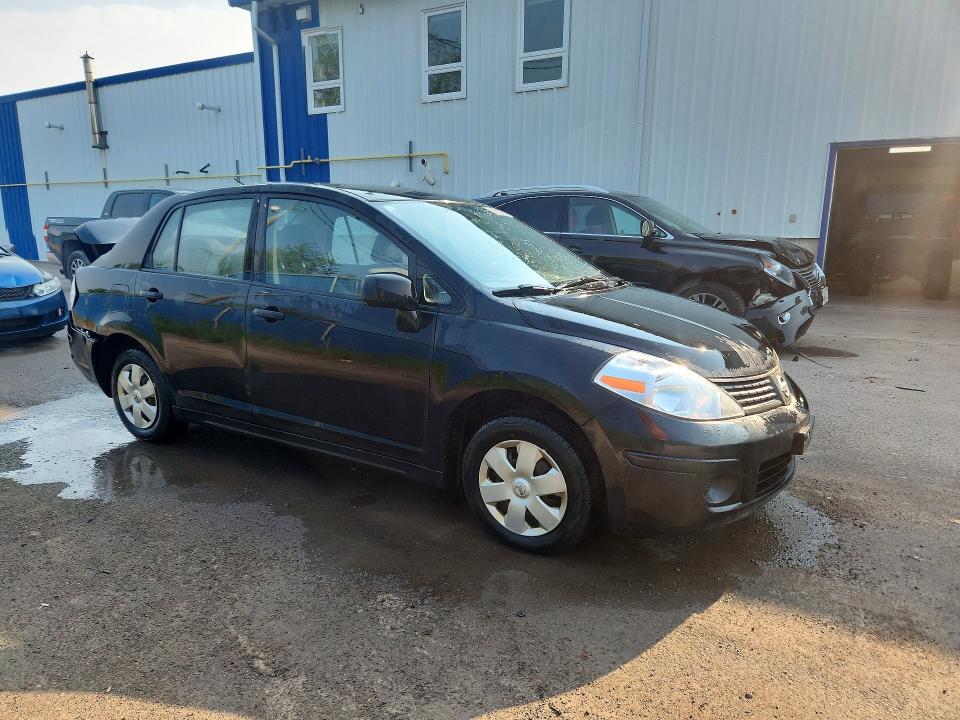 Photo 4 from auction – 2011 NISSAN VERSA with VIN 3N1CC1AP7BL498115