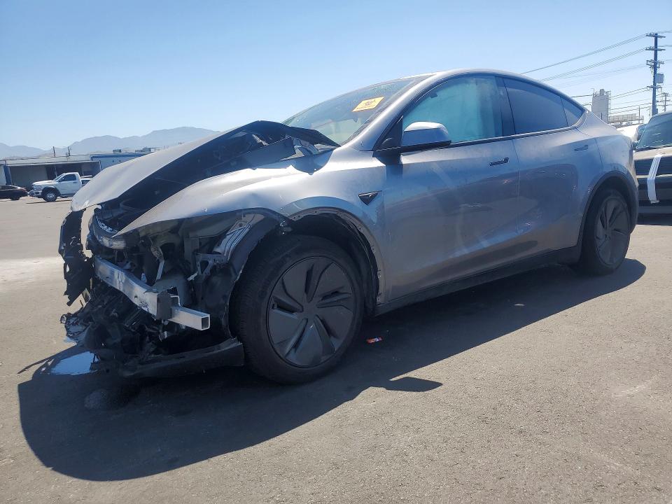 TESLA MODEL Y 2026 with VIN 7SAYGDED4TF520390 - Photo from auction