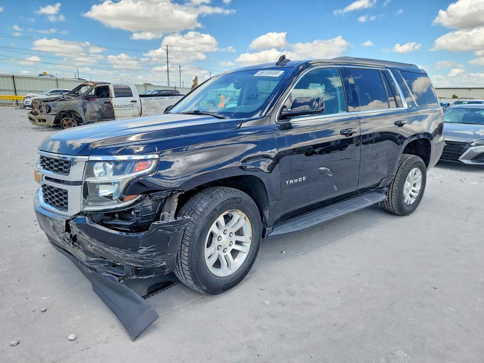 CHEVROLET TAHOE 2019 with VIN 1GNSKBKC7KR350950 - Photo from auction