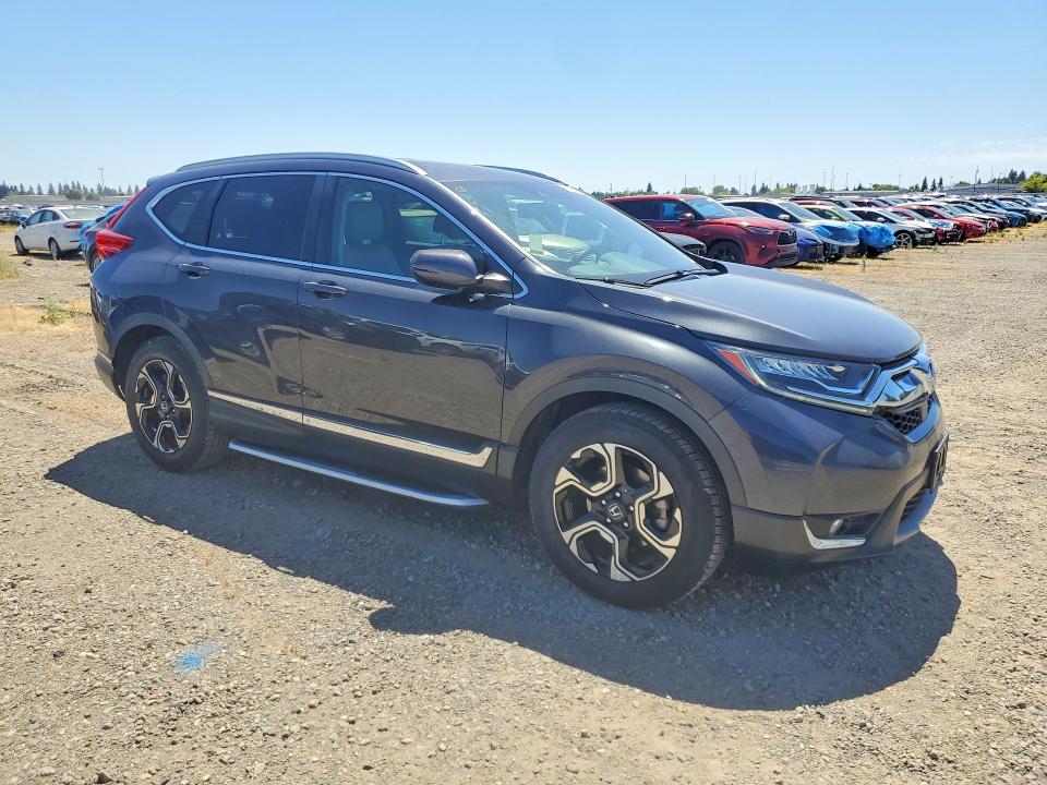 Photo 4 from auction – 2018 HONDA CR-V with VIN 7FARW1H90JE018049