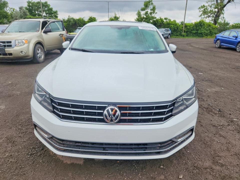 Photo 5 from auction – 2016 VOLKSWAGEN PASSAT with VIN 1VWCS7A38GC034606