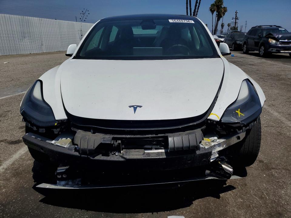 Photo 5 from auction – 2021 TESLA MODEL 3 with VIN 5YJ3E1EA2MF068975