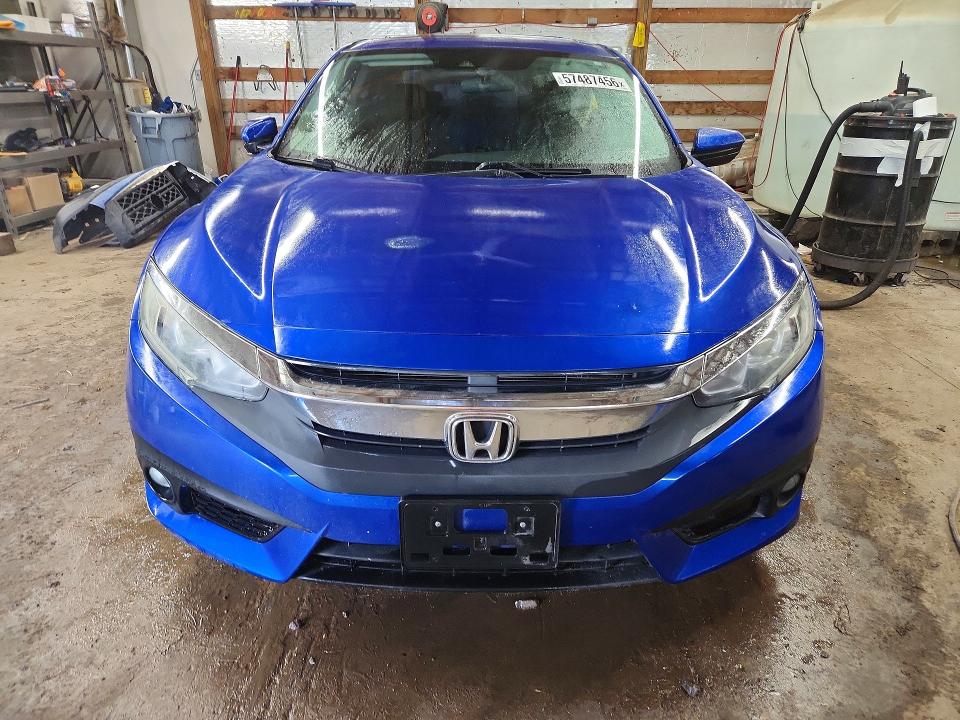 Photo 5 from auction – 2016 HONDA CIVIC with VIN 19XFC1F45GE209429