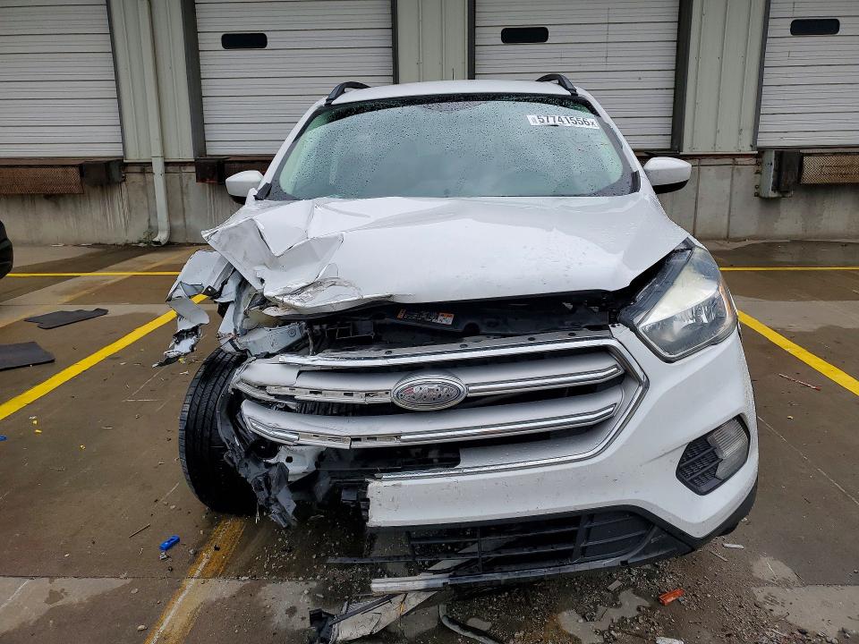 Photo 5 from auction – 2018 FORD ESCAPE with VIN 1FMCU0GD7JUC03970