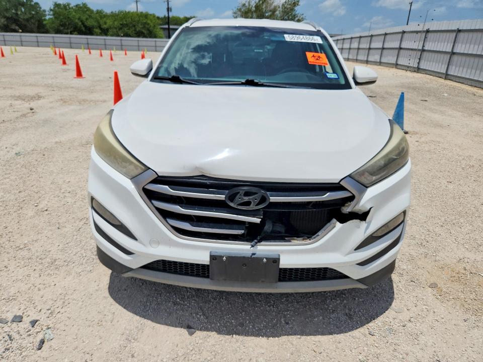 Photo 5 from auction – 2017 HYUNDAI TUCSON with VIN KM8J3CA29HU587022