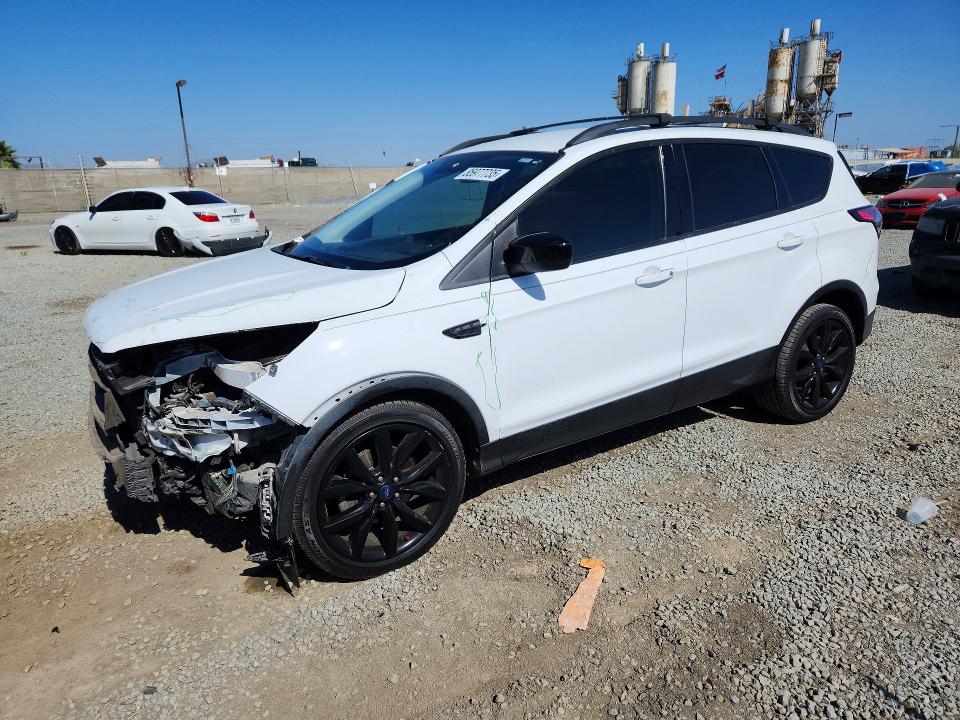 FORD ESCAPE 2018 with VIN 1FMCU0GD2JUC06789 - Photo from auction