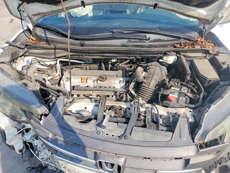 Photo 12 from auction – 2014 HONDA CR-V with VIN 5J6RM3H35EL017274