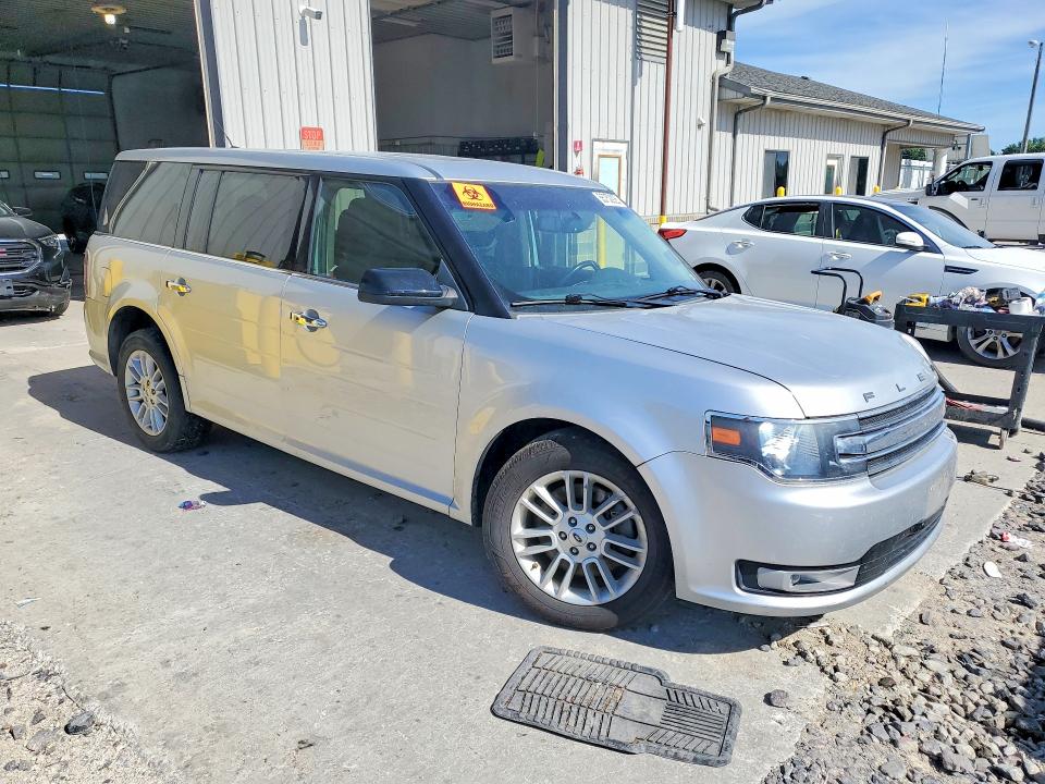 Photo 4 from auction – 2016 FORD FLEX with VIN 2FMHK6C87GBA05105