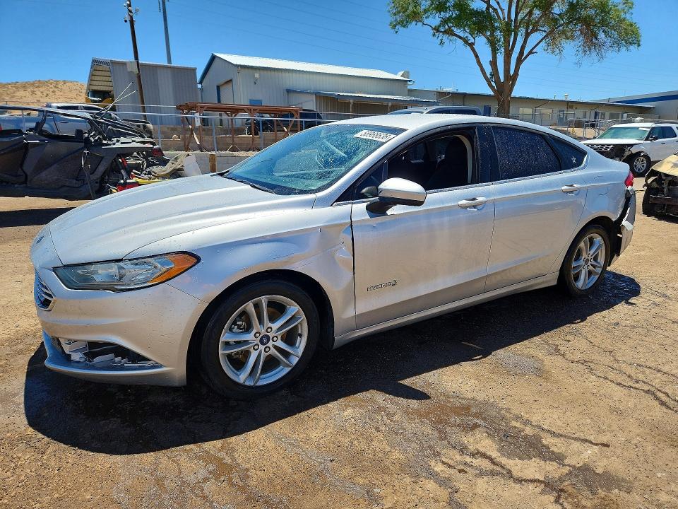 FORD FUSION 2018 with VIN 3FA6P0LU5JR139942 - Photo from auction
