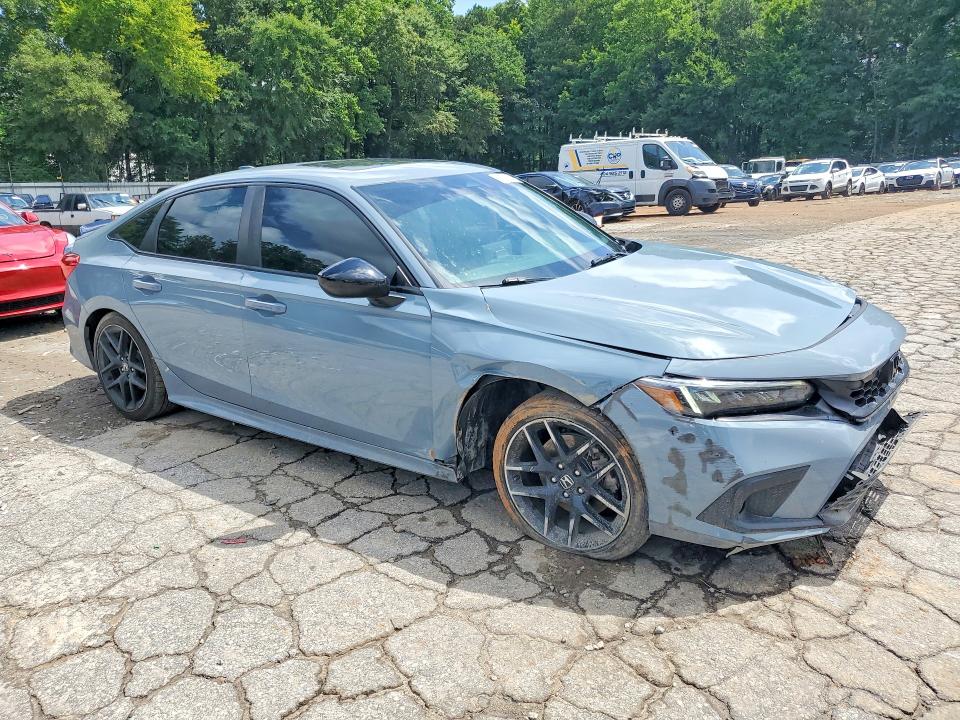 Photo 4 from auction – 2023 HONDA CIVIC with VIN 2HGFE1E53PH472187
