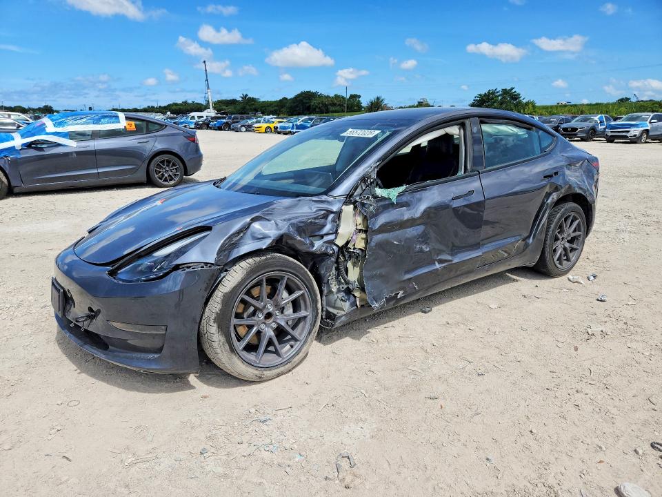 TESLA MODEL 3 2023 with VIN 5YJ3E1EA7PF697474 - Photo from auction