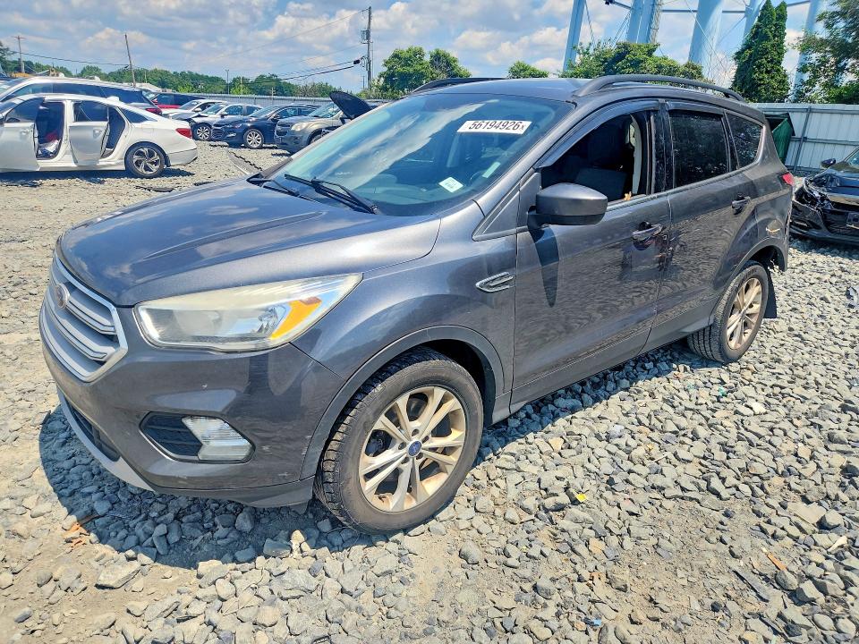 FORD ESCAPE 2018 with VIN 1FMCU9GD6JUA35307 - Photo from auction
