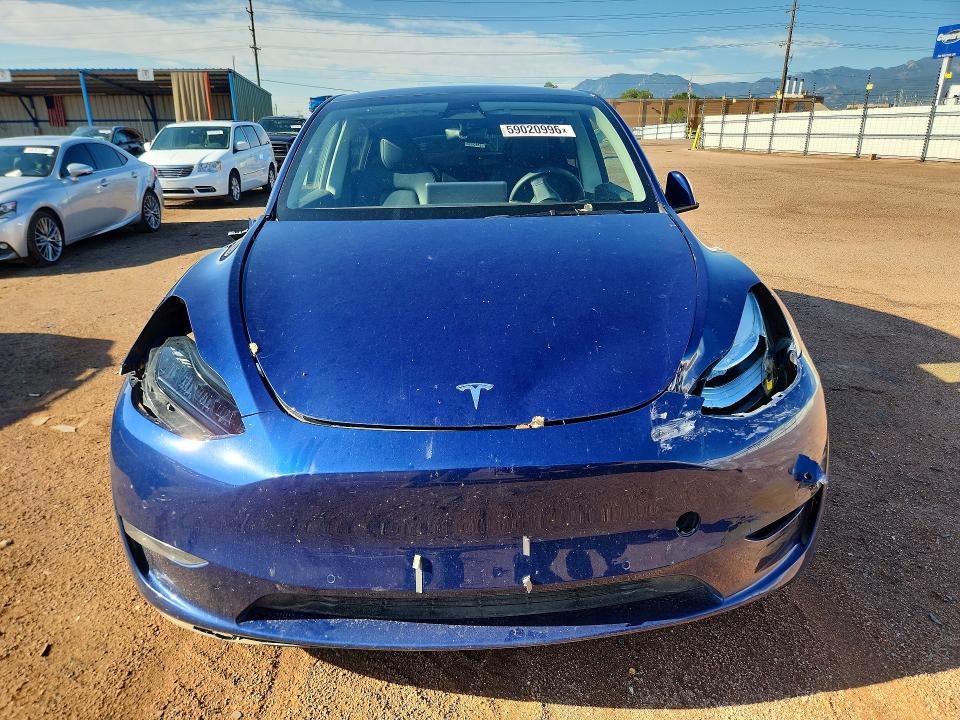 Photo 5 from auction – 2022 TESLA MODEL Y with VIN 7SAYGDEE3NA011075