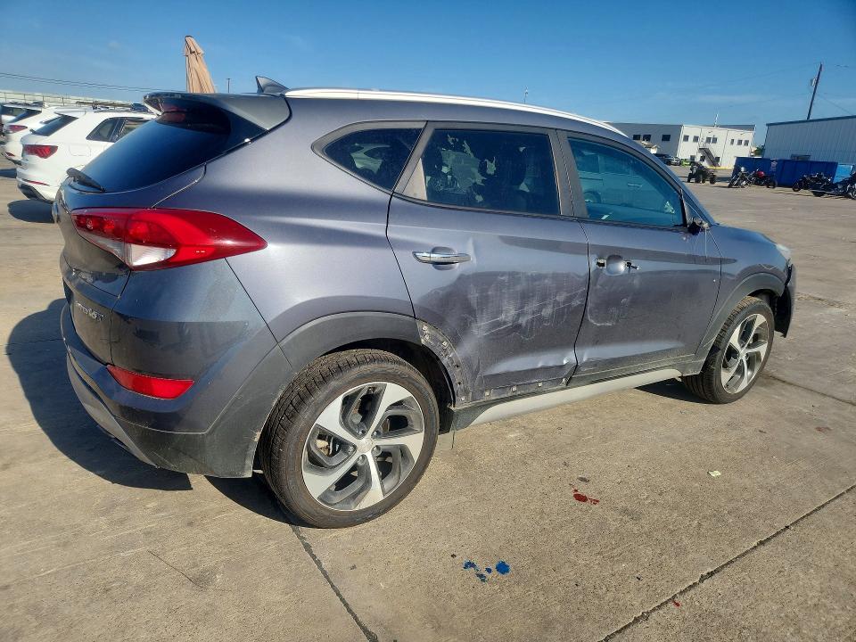 Photo 3 from auction – 2018 HYUNDAI TUCSON with VIN KM8J33A23JU829793