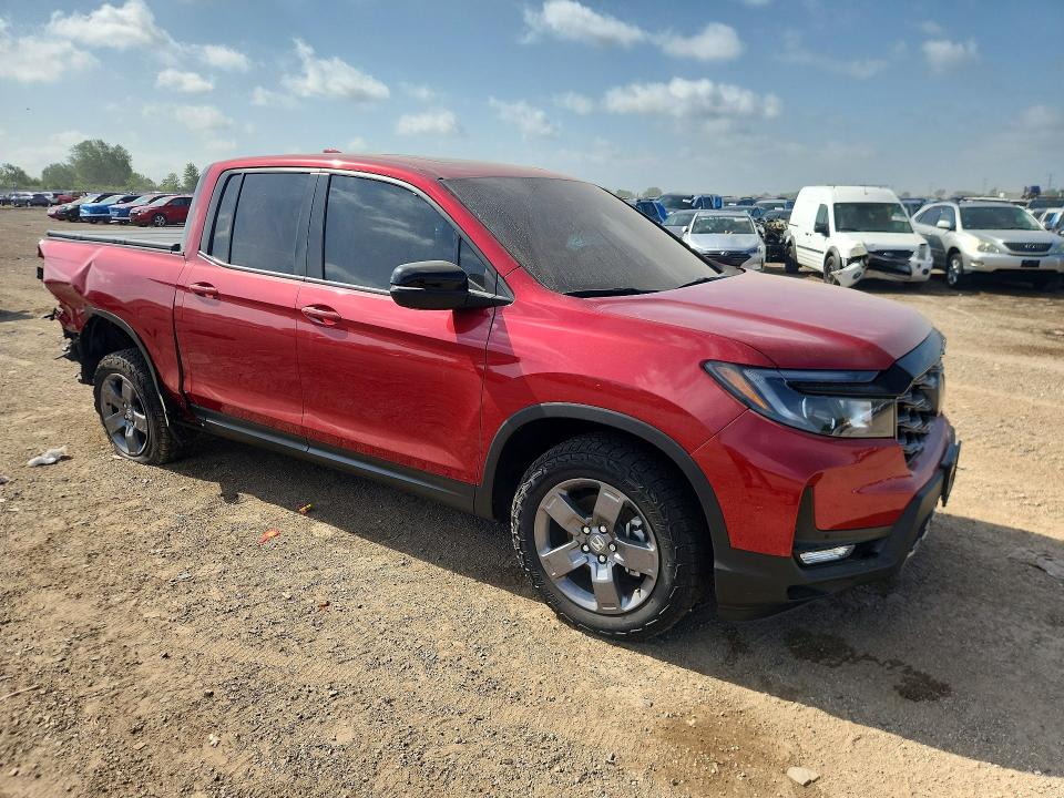 Photo 4 from auction – 2024 HONDA RIDGELINE with VIN 5FPYK3F65RB000057