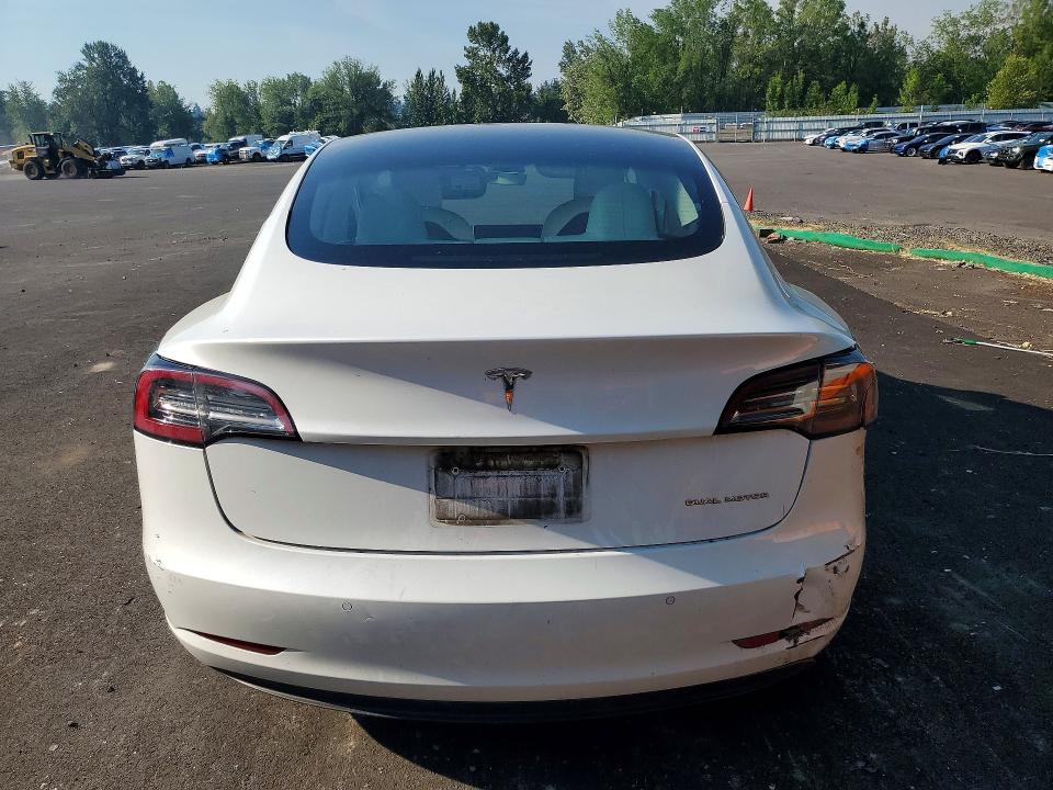 Photo 6 from auction – 2022 TESLA MODEL 3 with VIN 5YJ3E1EB4NF364249