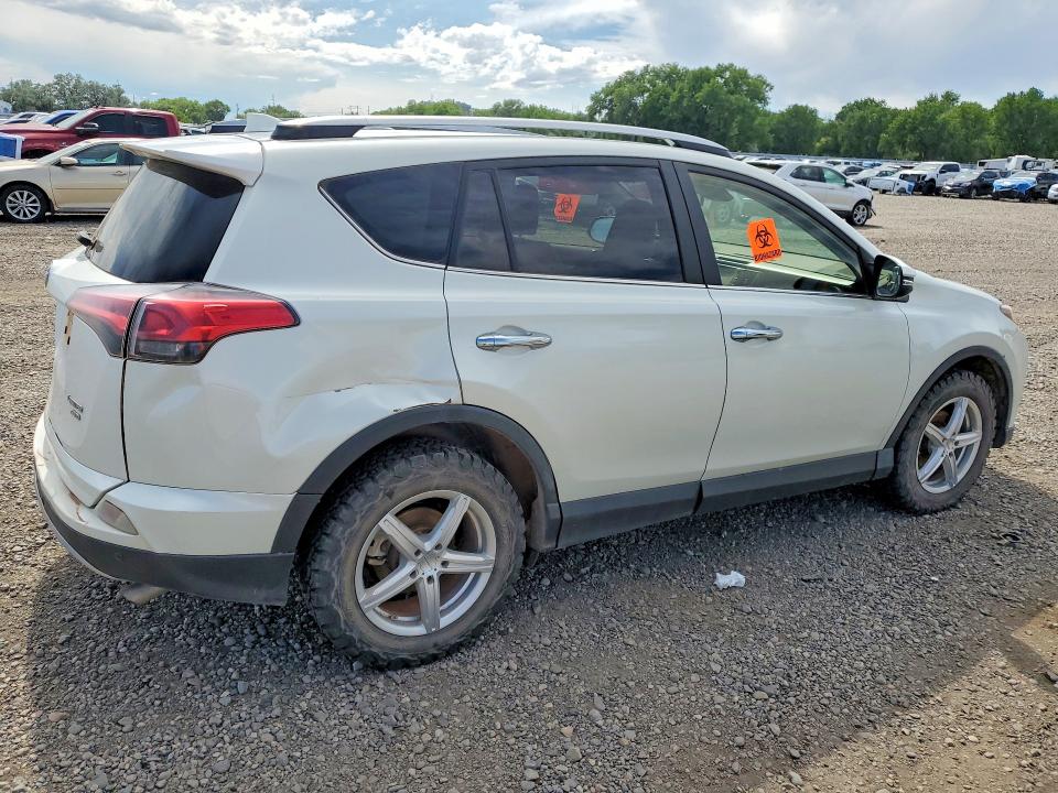 Photo 3 from auction – 2018 TOYOTA RAV4 with VIN JTMDFREV3JJ189991