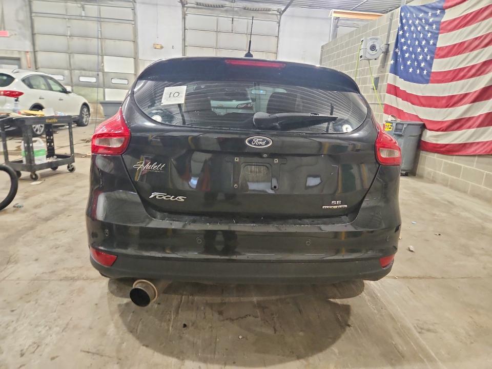 Снимка 6 от търг – 2015 FORD FOCUS с VIN 1FADP3K20FL285986