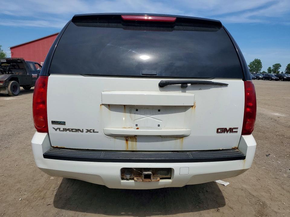 Photo 6 from auction – 2011 GMC YUKON XL with VIN 1GKS2HE37BR127559