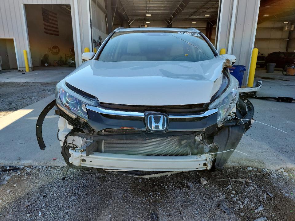 Photo 5 from auction – 2015 HONDA CR-V with VIN 5J6RM4H92FL005143