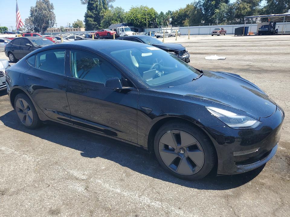 Photo 4 from auction – 2021 TESLA MODEL 3 with VIN 5YJ3E1EA7MF074710