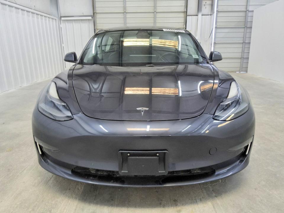 Photo 5 from auction – 2021 TESLA MODEL 3 with VIN 5YJ3E1EB5MF979066