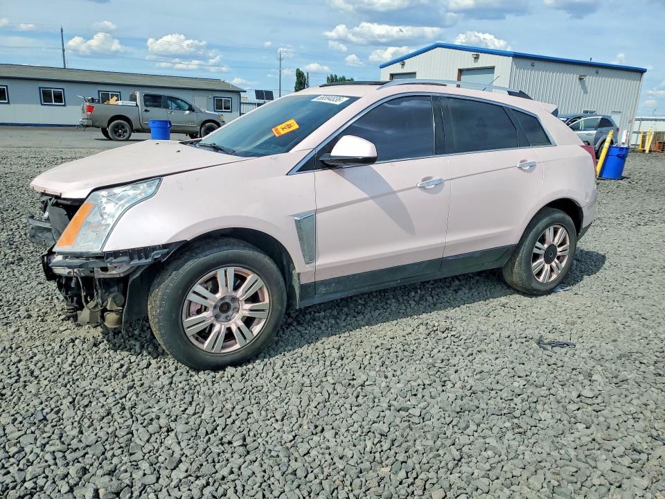 CADILLAC SRX 2015 with VIN 3GYFNBE31FS602685 - Photo from auction