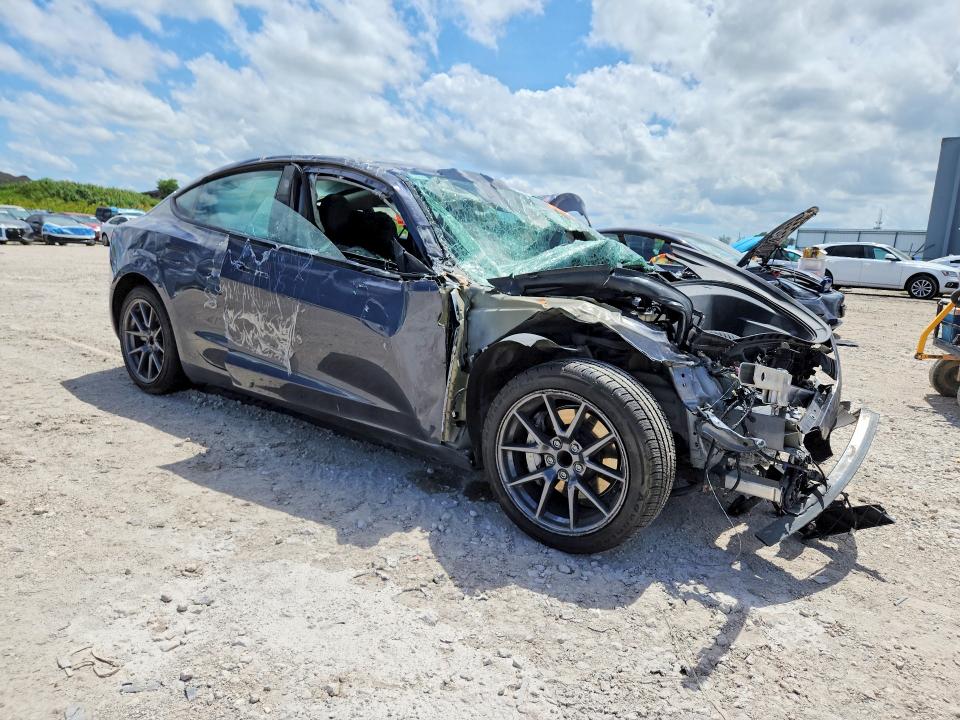Photo 4 from auction – 2023 TESLA MODEL 3 with VIN 5YJ3E1EA6PF648783